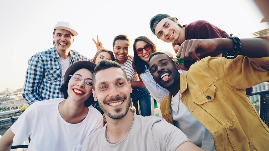 Diverse group of media professionals celebrating outdoors