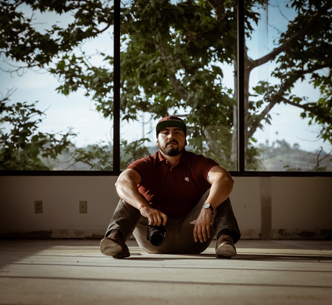 Portrait of a male trainer and video journalist expert